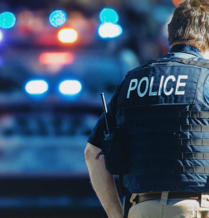 Manhattan 2019. Behind the police with gun belt